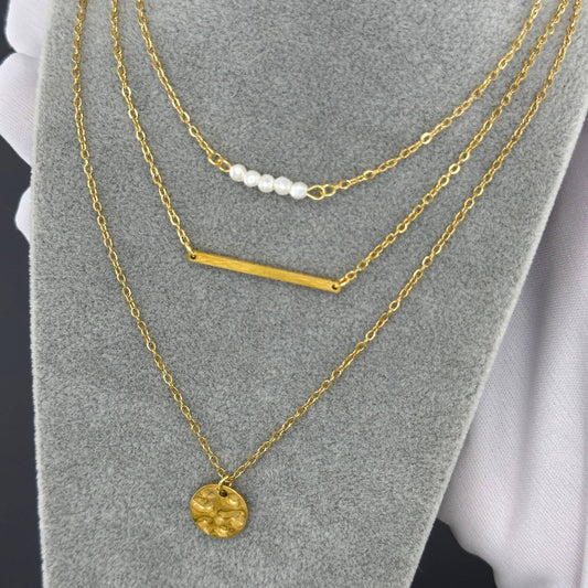 Layered gold pendant